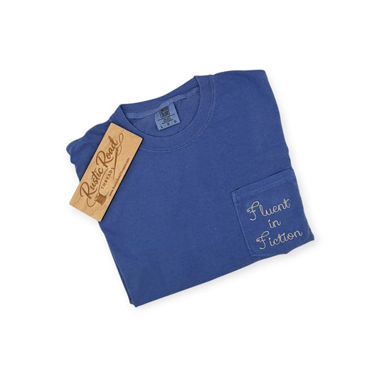 "Fluent in Fiction" Embroidered Comfort Colors Pocket Tee
